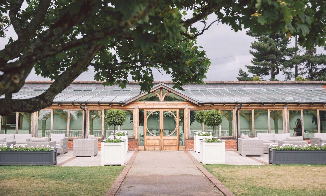 Jonathan and Louise working as a Gaynes Park Wedding Videographer in Epping, Essex