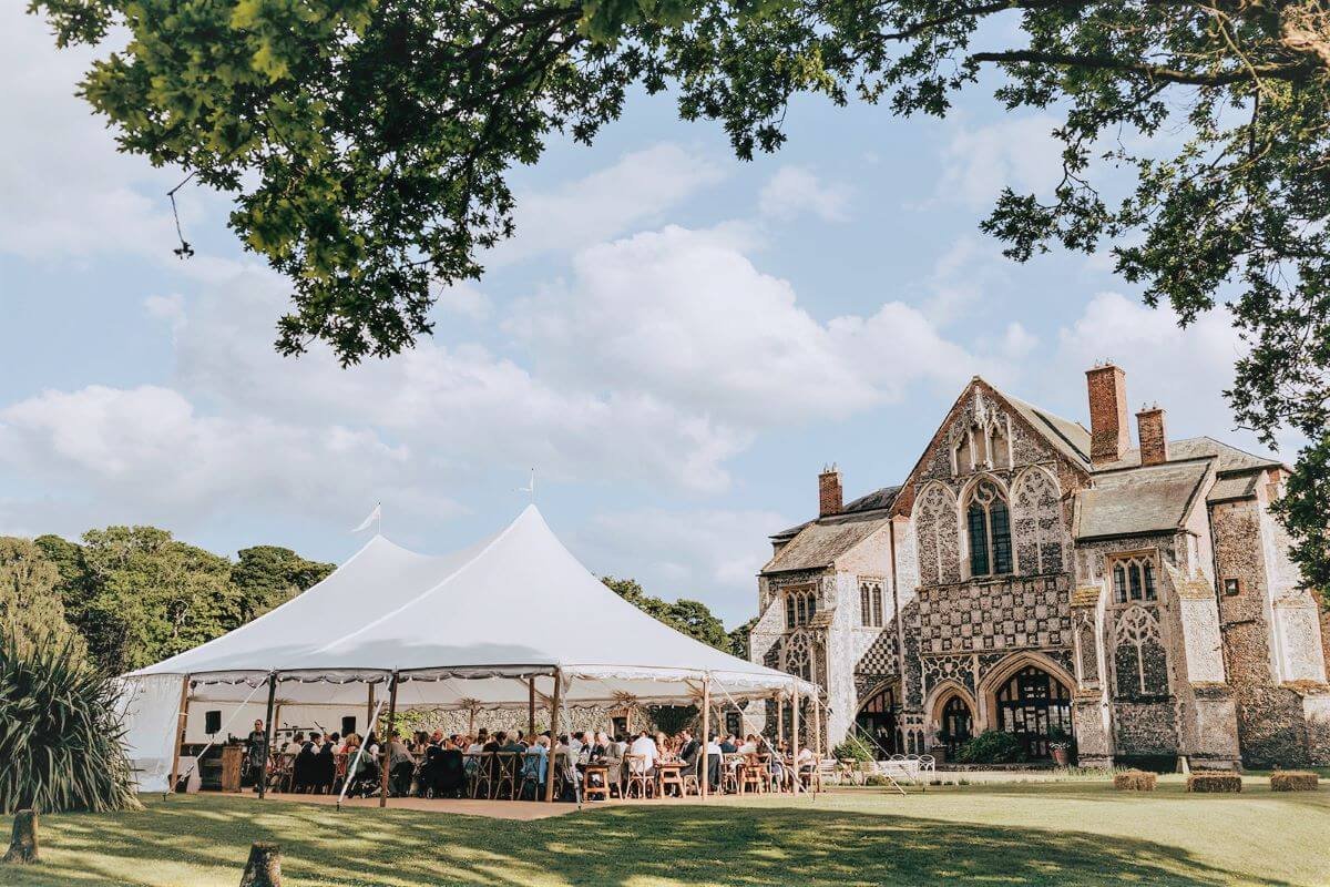 Jonathan and Louise working as a Butley Priory Wedding Videographer in Woodbridge, Suffolk