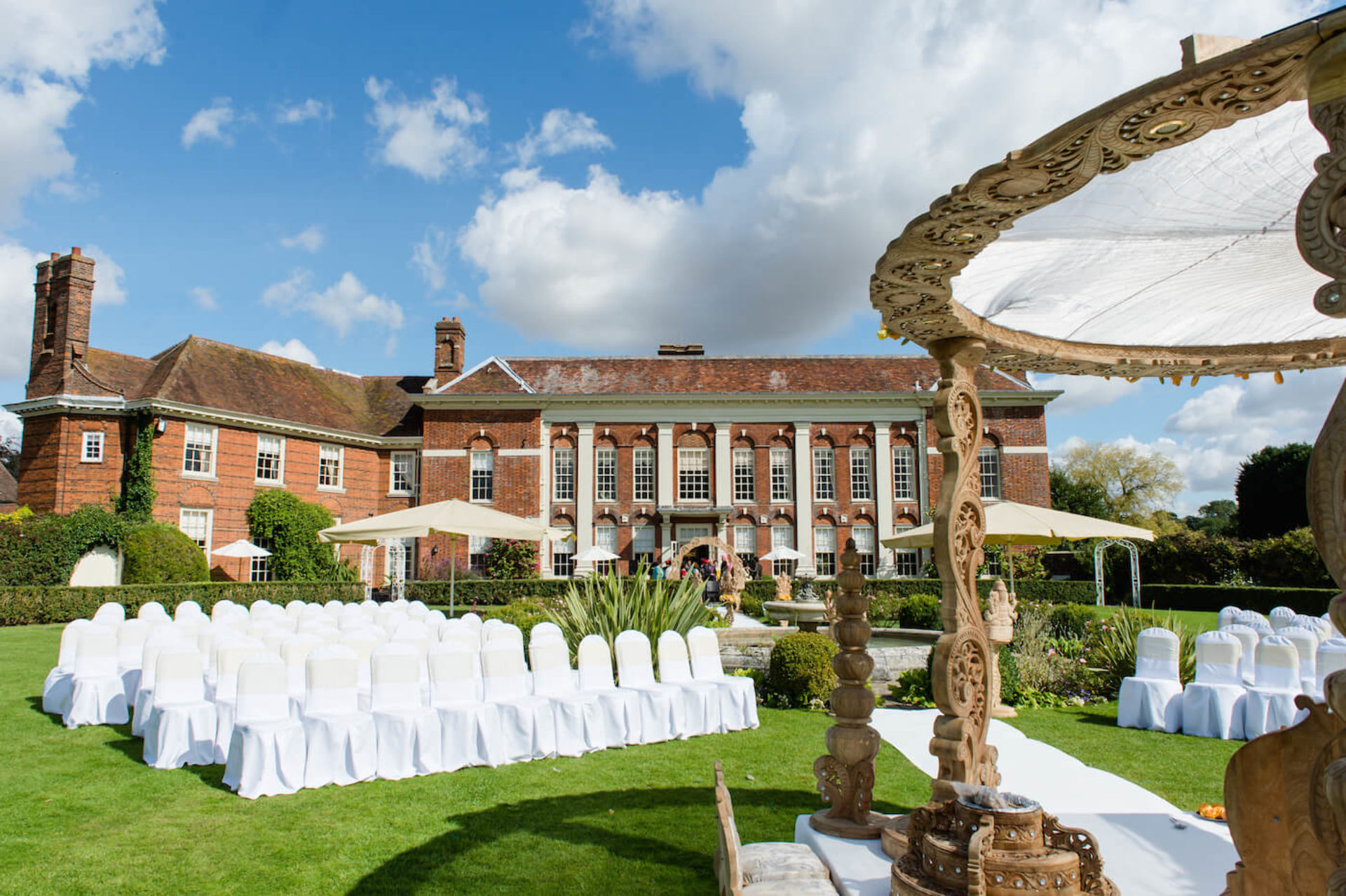 Jonathan and Louise working as a Parklands Quendon Hall Wedding Videographer at the 17th-century mansion in Essex