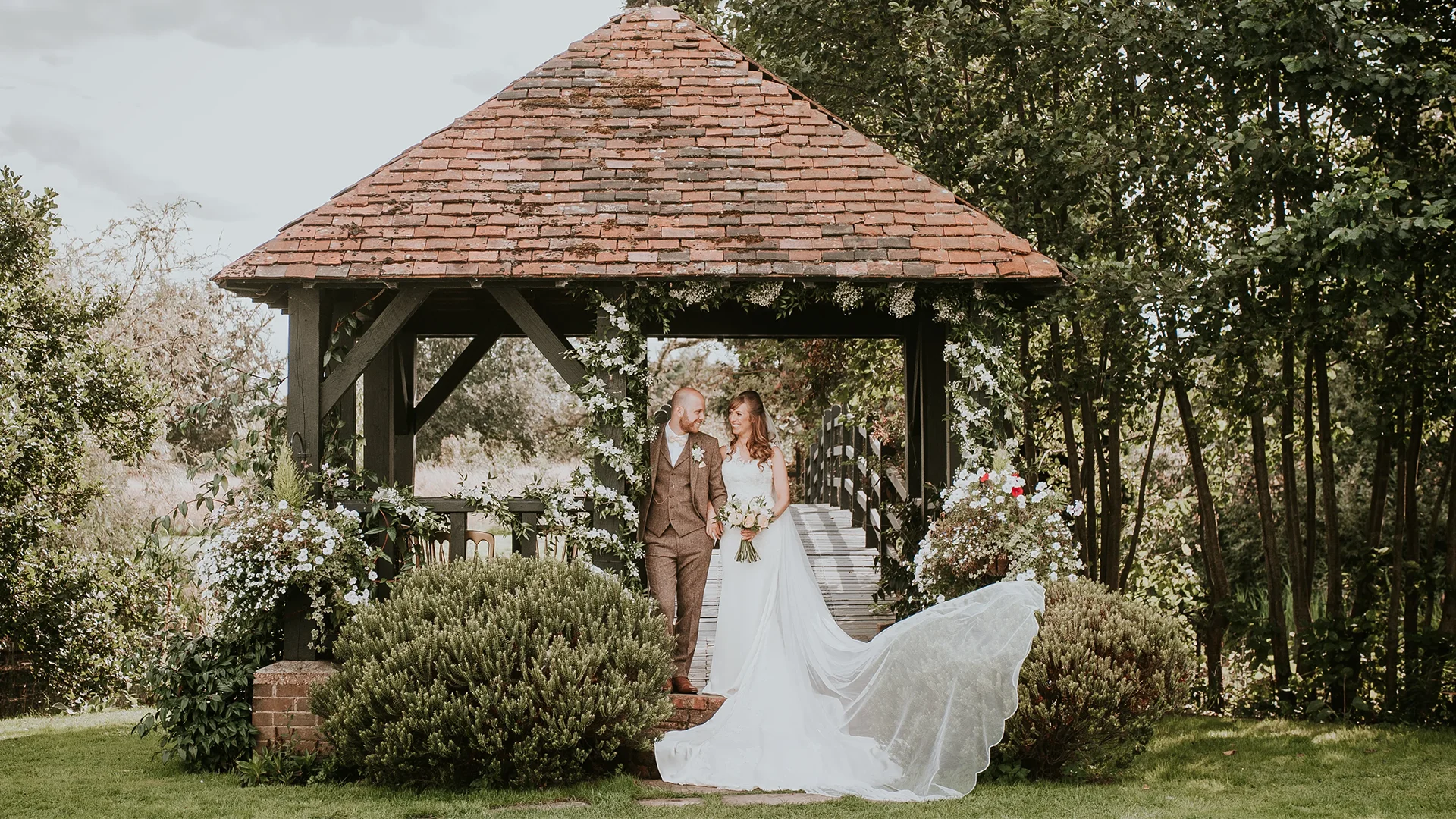 Jonathan and Louise working as a Prested Hall Wedding Videographer at the 15th-century moated manor in Essex