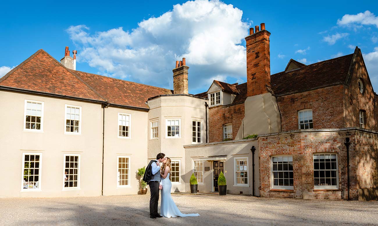 Jonathan and Louise working as a That Amazing Place Wedding Videographer at the contemporary boutique manor in Old Harlow, Essex