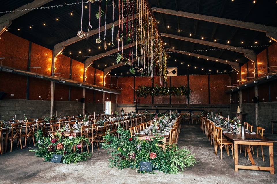 Jonathan and Louise working as a The Barns at Lodge Farm Wedding Videographer at the industrial-rural barn venue in Epping, Essex