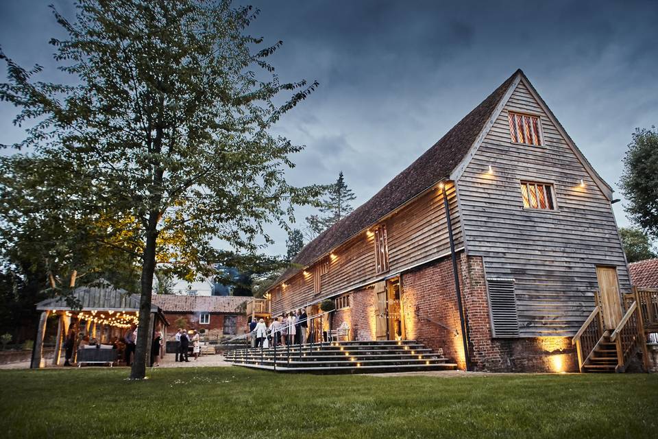 Jonathan and Louise working as a Tudor Barn Belstead Wedding Videographer at the historic 16th-century barn in Ipswich