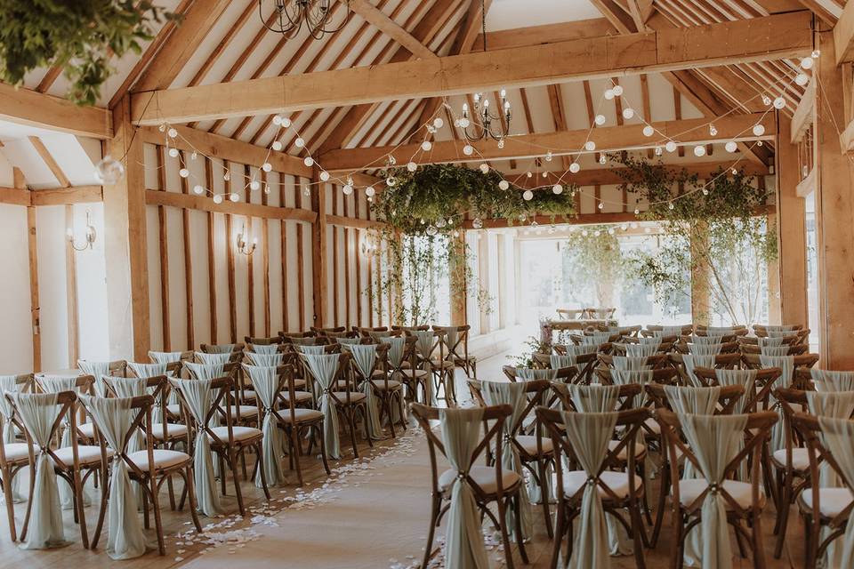 Vaulty Manor Wedding Videographer 1 Jonathan and Louise working as a Vaulty Manor Wedding Videographer at the historic 17th-century barn in Goldhanger, Essex